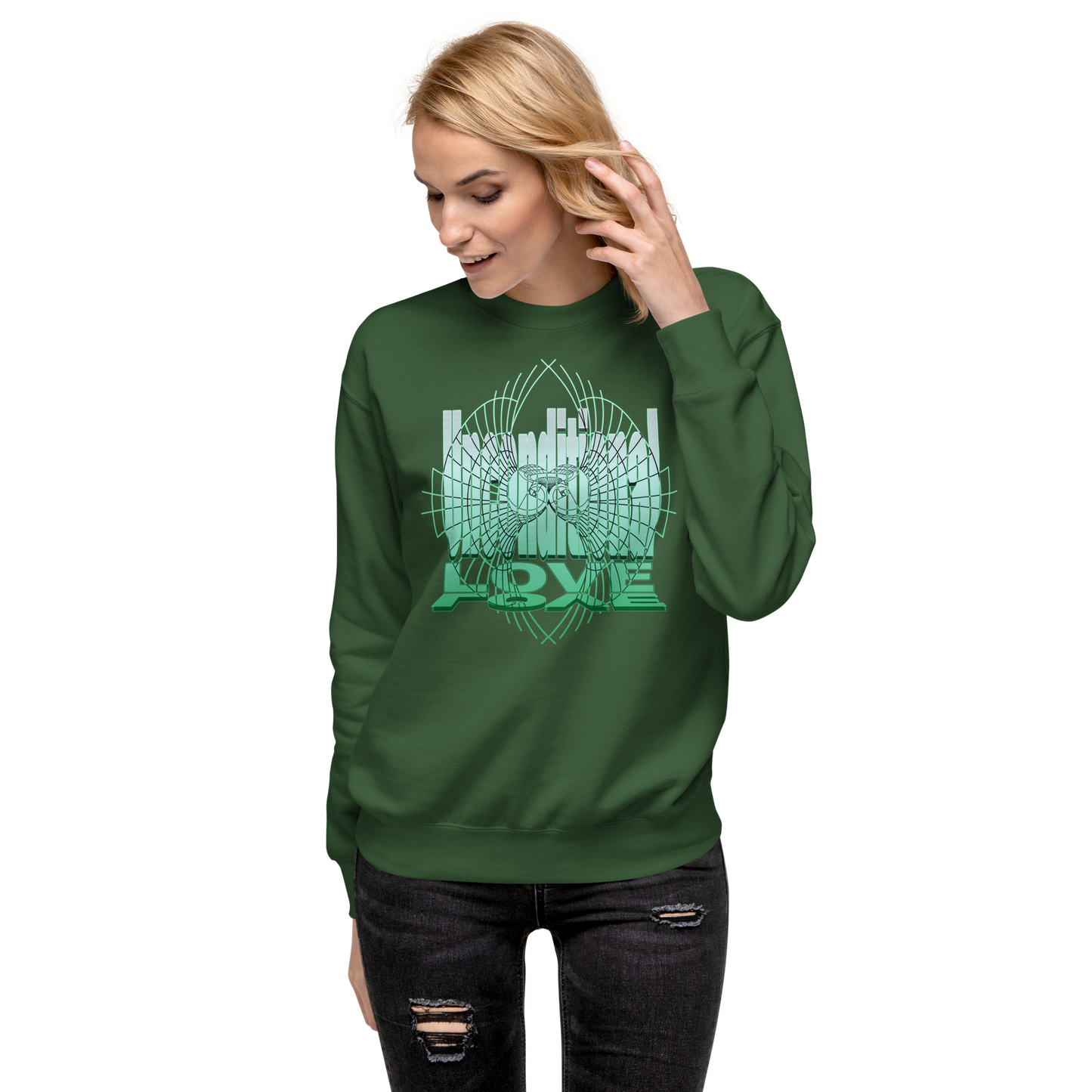 Female model wearing a forest green unisex sweatshirt with green 'Unconditional Love' design featuring the words and a heart with wings in a torus shape, symbolizing mindfulness and compassion