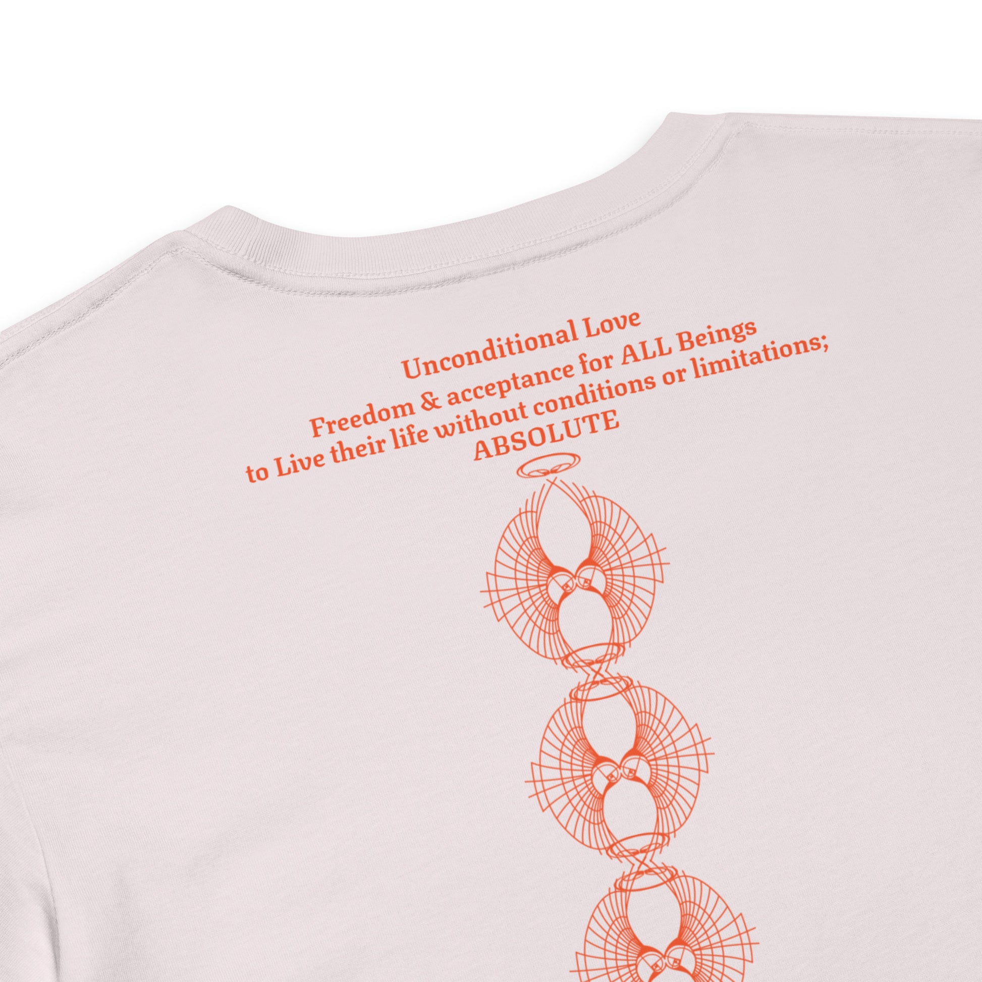 Close up back view of the Unconditional Love design in orange on Orchid color crop top showing the phrase 'Unconditional Love: Freedom & Acceptance for All Beings, to live their life without conditions or limitations; ABSOLUTE' along with three of the Rose Fibonacci Designs logo stacked vertically