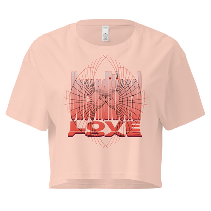 Unconditional Love design in orange on pale pink color crop top featuring geometric heart design with a mindful message